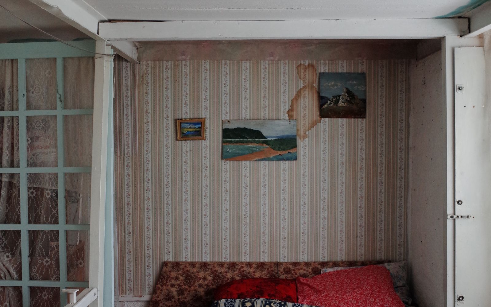 Damp patch spreading across a ceiling
