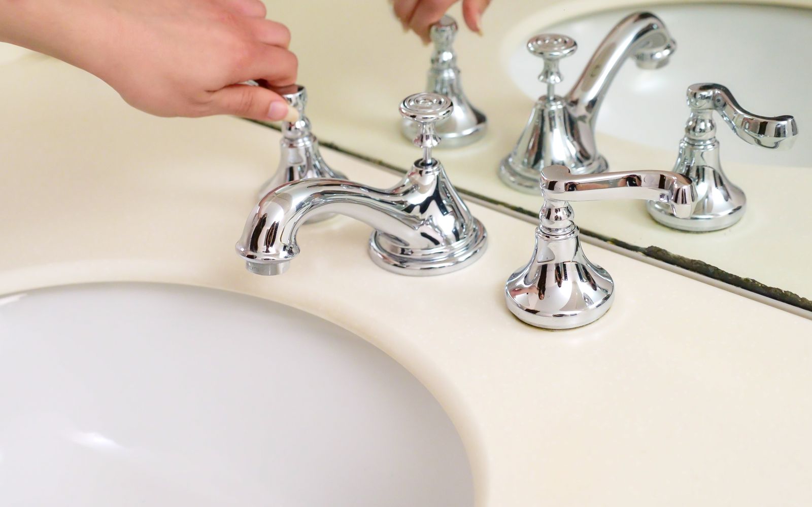 Kitchen faucet being repaired