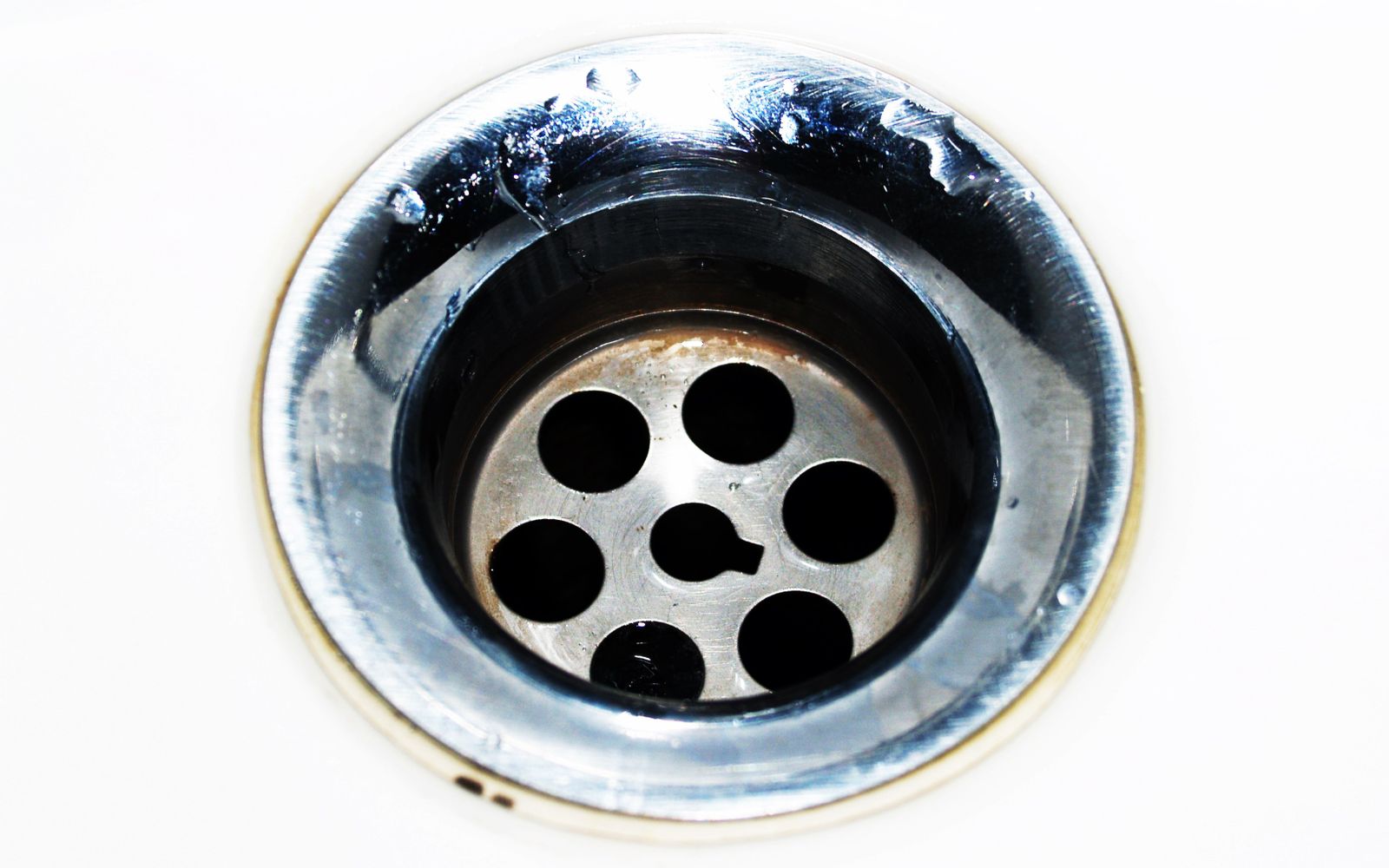 Garbage disposal unit under a kitchen sink